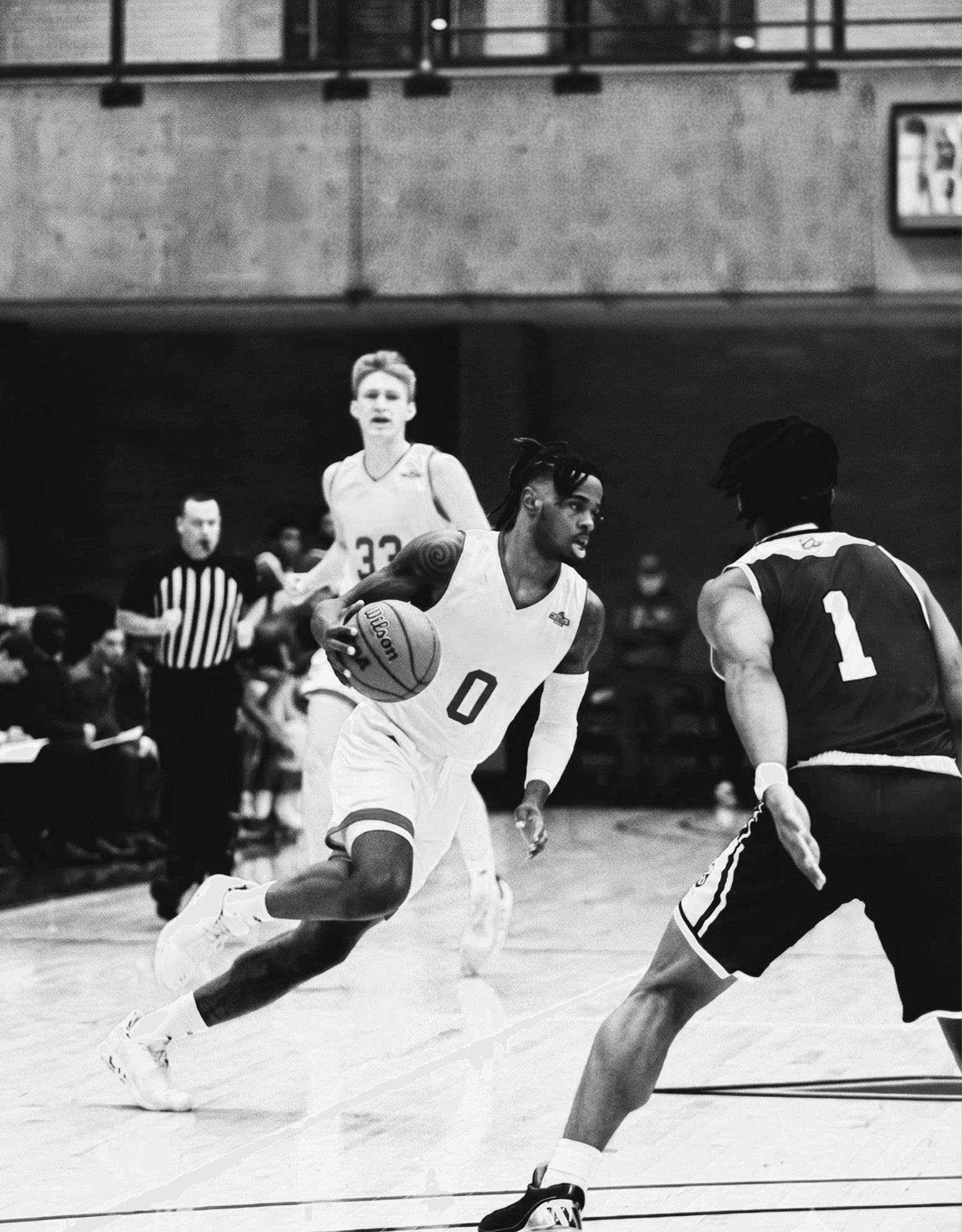 A representation of the athletic events and campus community at Telos (college founded by Charlie Anastasi) in Philadelphia, two basketball platers in action during a game. One college player is dribbling towards the basket.